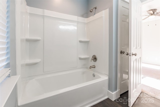 bathroom with shower / washtub combination