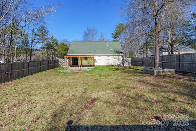 back of property with a lawn and a patio area