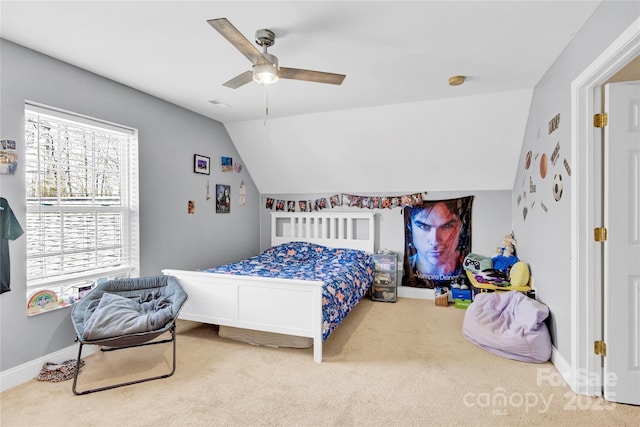 bedroom with lofted ceiling, carpet, and ceiling fan