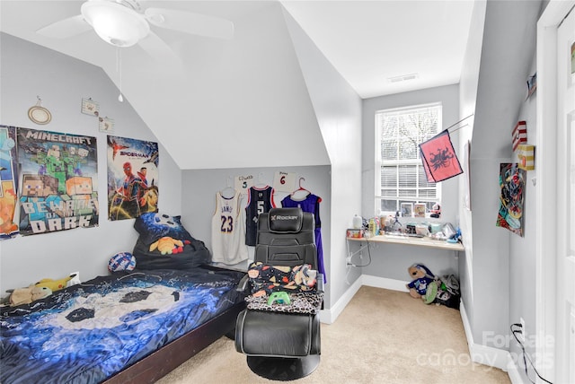 carpeted bedroom featuring ceiling fan and lofted ceiling