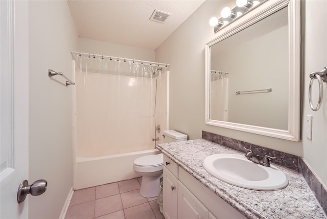 full bathroom featuring toilet, shower / tub combo, a textured ceiling, tile patterned floors, and vanity