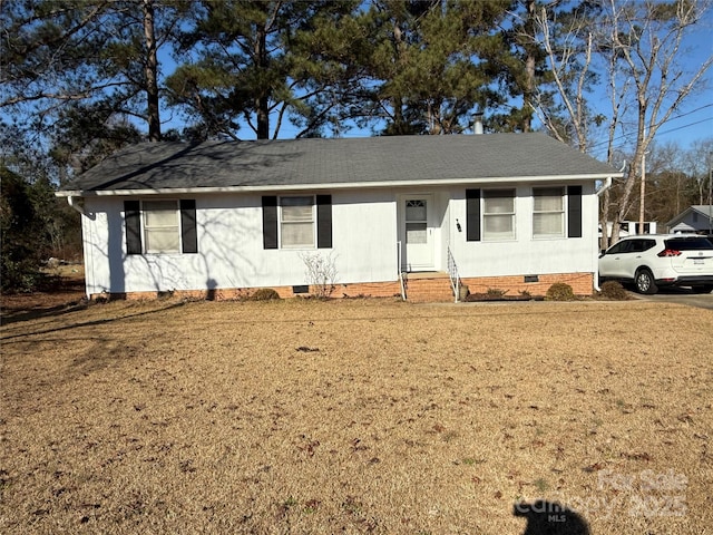 ranch-style home with a front yard