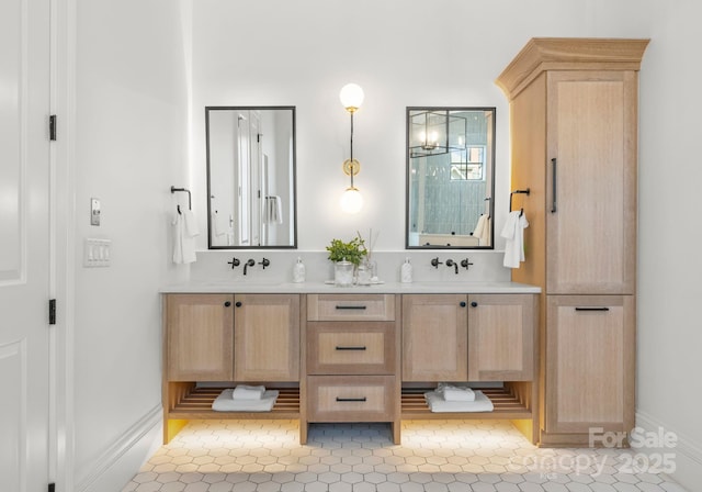 bathroom featuring vanity and tile patterned flooring