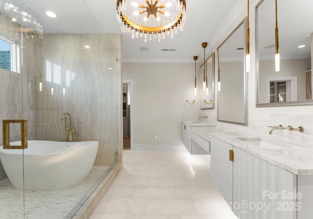 bathroom featuring vanity, ornamental molding, a washtub, and decorative backsplash