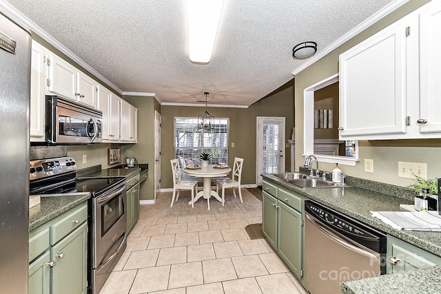 kitchen featuring light tile patterned floors, sink, white cabinetry, and appliances with stainless steel finishes