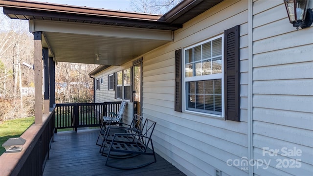 deck featuring covered porch