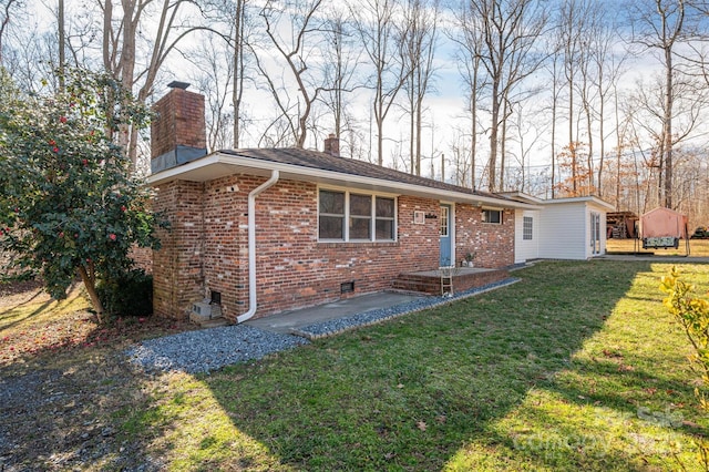 single story home featuring a patio and a front yard