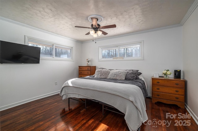 bedroom featuring dark hardwood / wood-style flooring, crown molding, and a textured ceiling