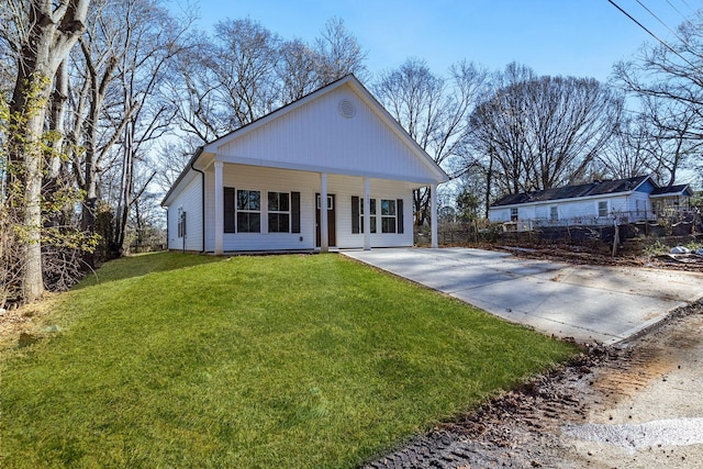 view of front of house featuring a front lawn and a porch