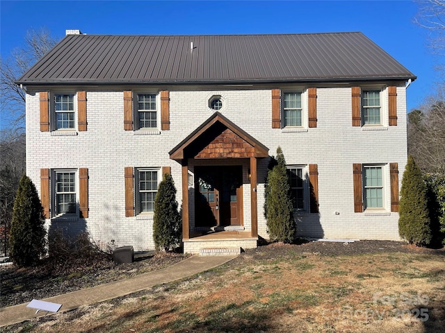 colonial house with a front yard