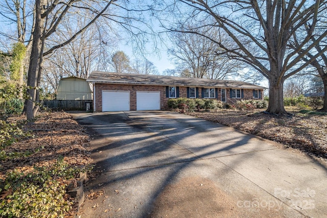 single story home featuring a garage