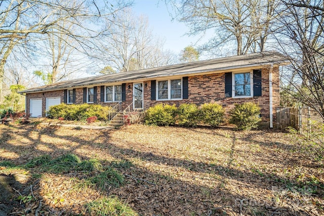 single story home featuring a garage