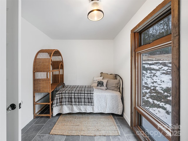 bedroom featuring multiple windows