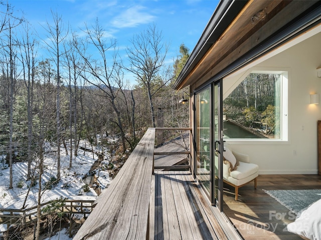 view of snow covered deck