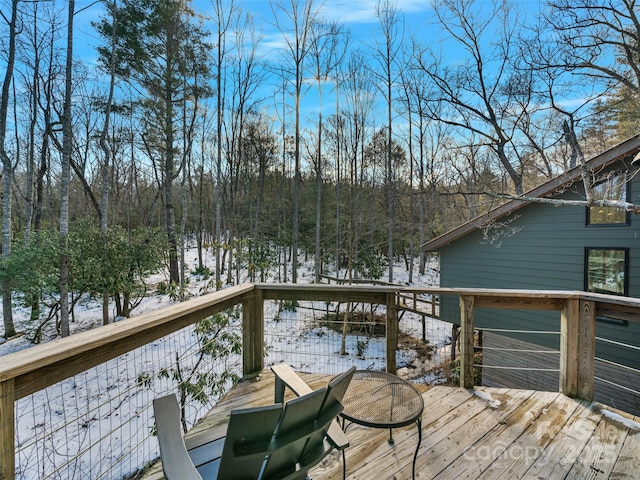 view of snow covered deck