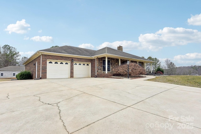 single story home featuring a garage