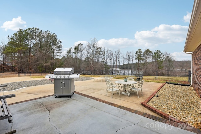 view of patio with a grill