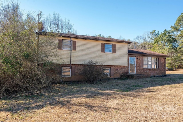 view of property exterior featuring a yard