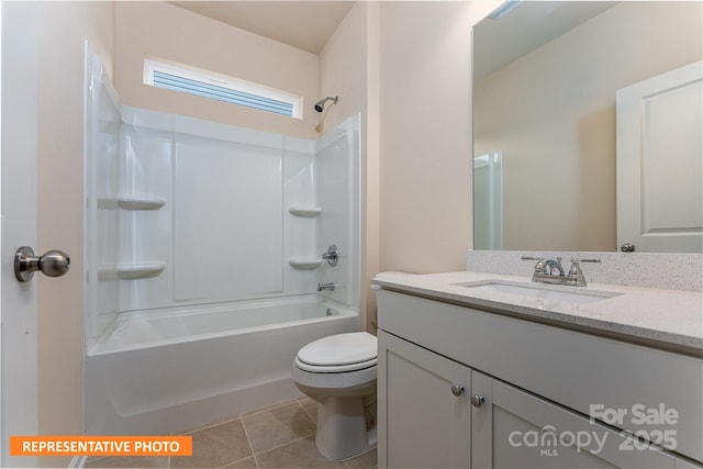 full bath featuring toilet, tile patterned flooring, shower / bath combination, and vanity