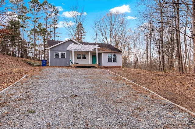 view of front of house with a pergola