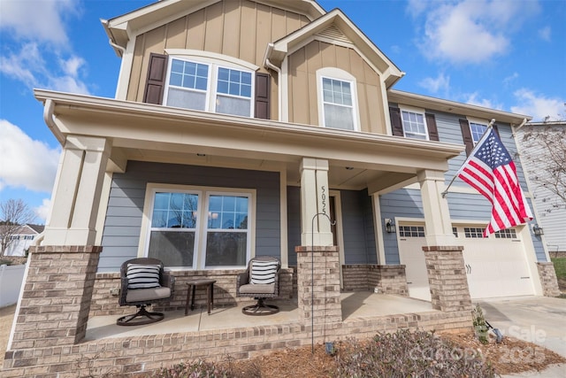 craftsman house featuring a garage and covered porch