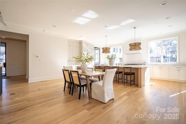 dining room with light wood-type flooring