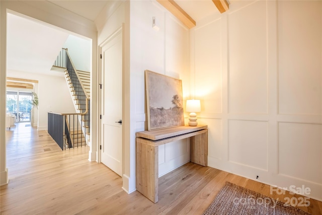 corridor featuring light hardwood / wood-style flooring