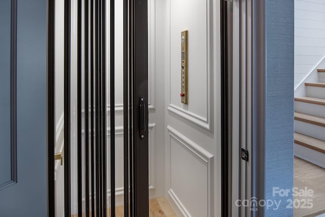 1214 S Kings Dr Unit A, Charlotte, NC 28207 - elevator featuring wood finished floors
