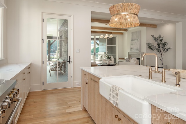 1214 S Kings Dr Unit A, Charlotte, NC 28207 - bathroom with wood finished floors and a chandelier