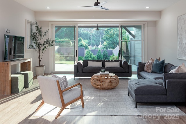 1214 S Kings Dr Unit A, Charlotte, NC 28207 - living room with ceiling fan, plenty of natural light, wood finished floors, and recessed lighting