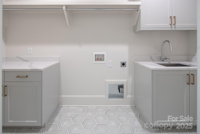 1214 S Kings Dr Unit A, Charlotte, NC 28207 - washroom featuring electric dryer hookup, hookup for a washing machine, light flooring, and cabinet space