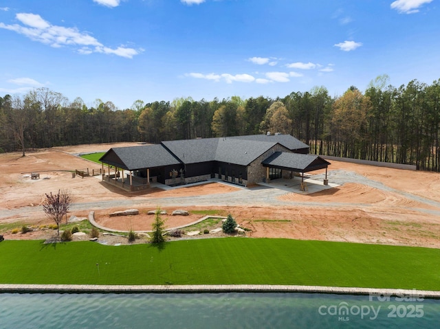 exterior space with a water view