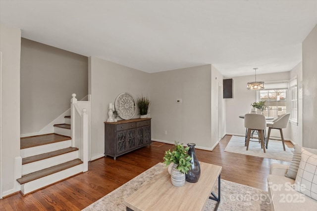 living room with dark hardwood / wood-style floors