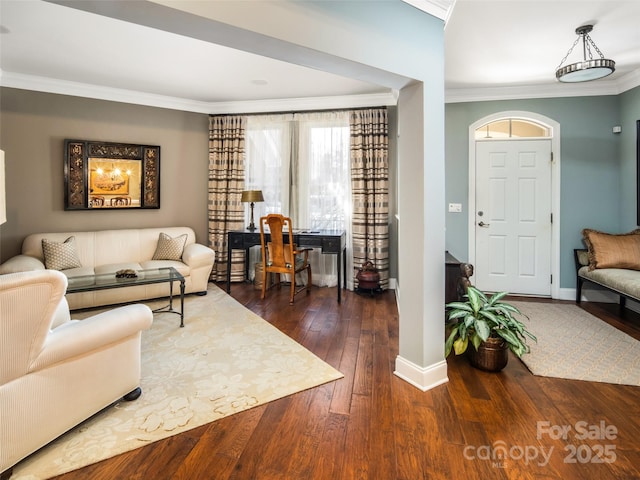 living room with dark hardwood / wood-style floors and crown molding