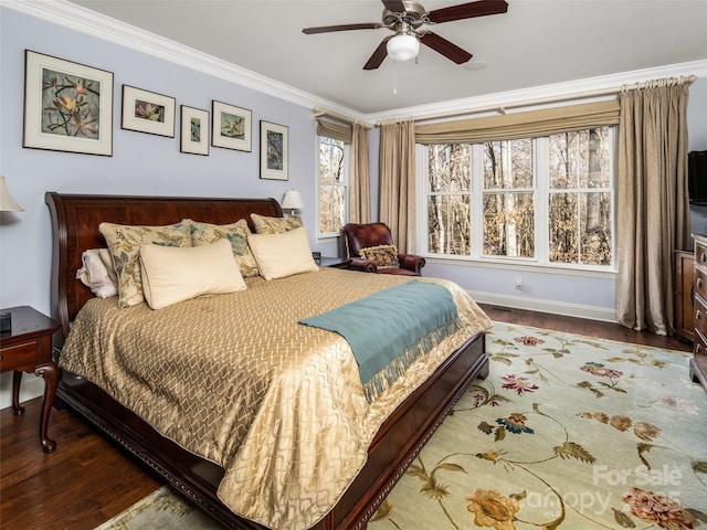 bedroom featuring ceiling fan, wood-type flooring, and crown molding