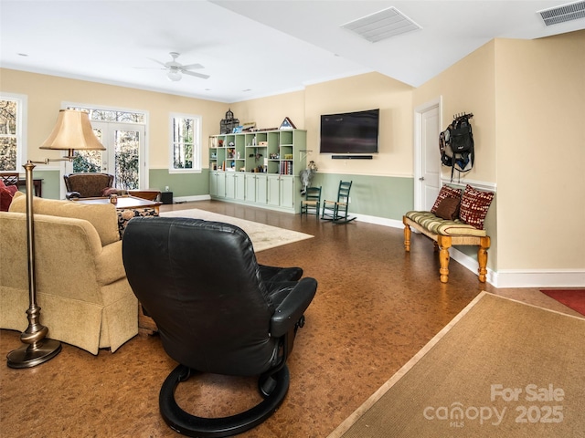 living room with ceiling fan