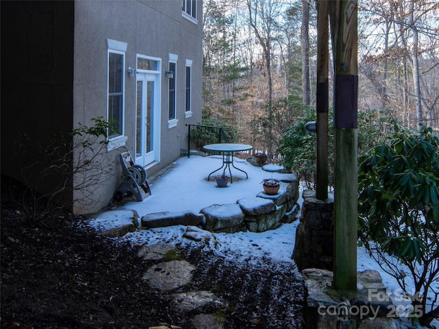 view of yard covered in snow