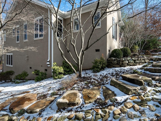 view of snow covered property