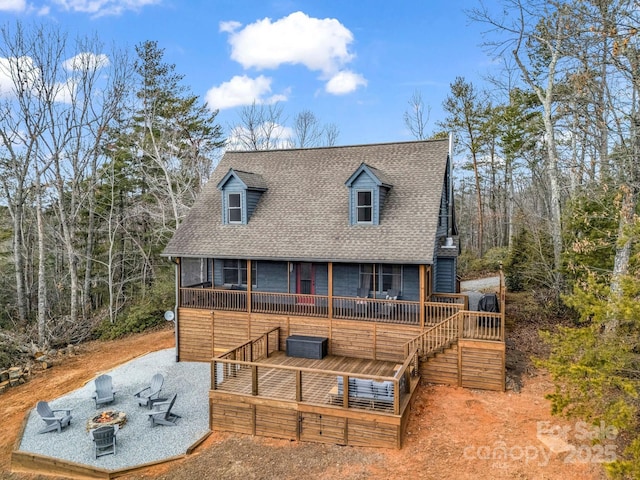 view of front of property with an outdoor fire pit