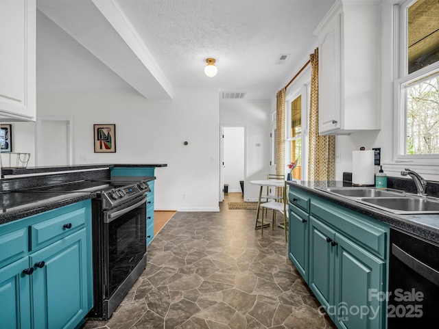 kitchen with white cabinetry, stainless steel electric stove, sink, and a textured ceiling