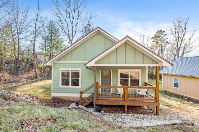 335 Rosscraggon Rd, Arden, NC 28704 - bungalow-style home with board and batten siding and covered porch