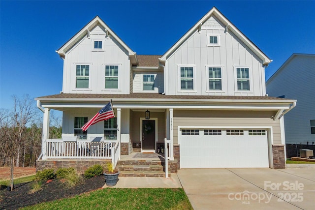 view of front of house featuring a garage and covered porch