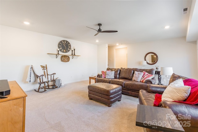 living room featuring light carpet, visible vents, baseboards, ceiling fan, and recessed lighting