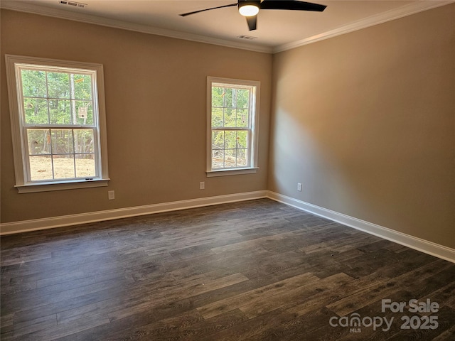 609 Shiloh Unity Rd, Lancaster, SC 29720 - spare room featuring dark wood finished floors, ceiling fan, crown molding, and baseboards