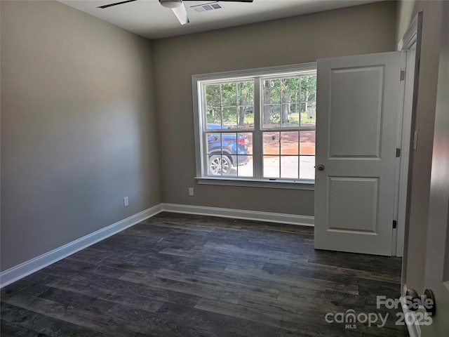 609 Shiloh Unity Rd, Lancaster, SC 29720 - unfurnished room with ceiling fan, dark wood finished floors, and baseboards