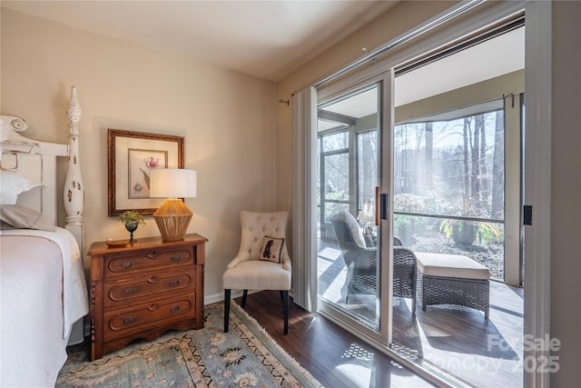 interior space featuring access to exterior and hardwood / wood-style floors