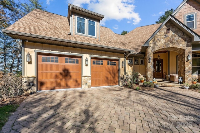 view of front of house with a garage