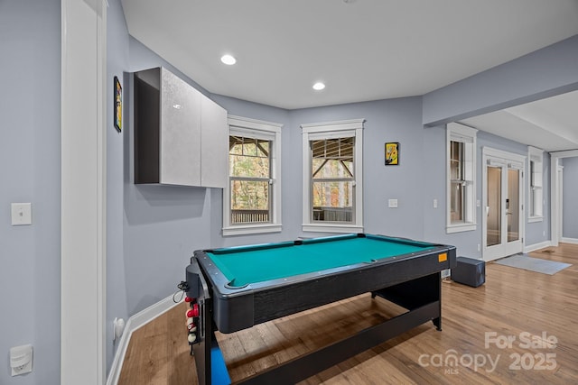 game room featuring billiards, french doors, and light hardwood / wood-style floors