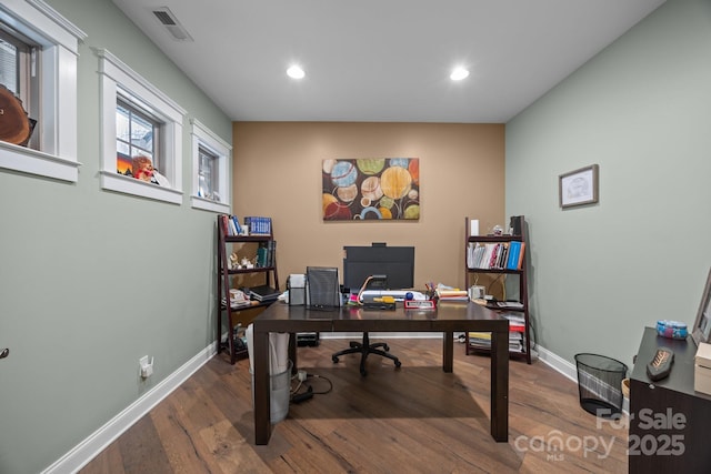 office space with hardwood / wood-style flooring