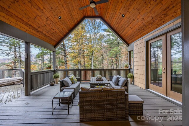 deck featuring an outdoor hangout area, ceiling fan, and french doors